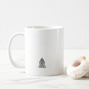 ein Schwarz-Weiß-Bild eines aufwendigen Designs Kaffeetasse