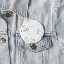 ein schwarz-weißes Foto von Blasen auf weißem Rück Button