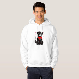 Ein schwarzer Welpe hält ein rotes Herz Hoodie