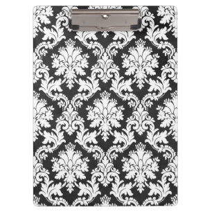 EIN SCHWARZES UND WEISSES DESIGN KLEMMBRETT