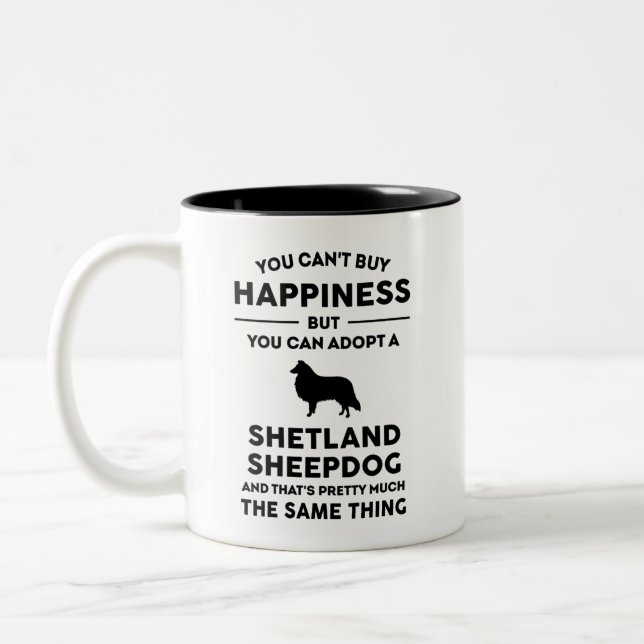 Ein Shetland Sheepdog Glück adoptiert Zweifarbige Tasse (Links)