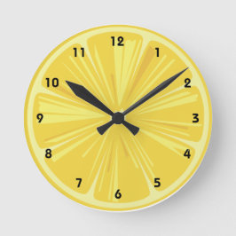 Ein Stück gelber Zitrone Runde Wanduhr
