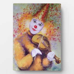 Ein süßer Clown, der Geige spielt Fotoplatte