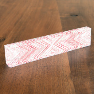 Ein symmetrisches Muster mit roten und rosa Motive Namensplakette