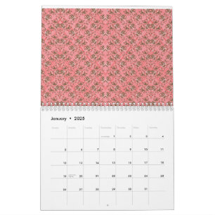 Ein Teppich mit roten und rosa Motiven ist mit ein Kalender