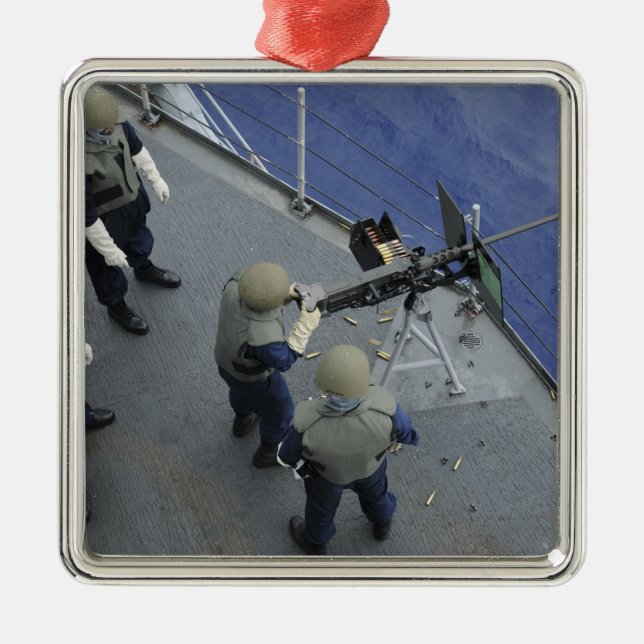Ein US-Seeleute feuert einen 50-Kaliber M2HB Silbernes Ornament (Vorne)