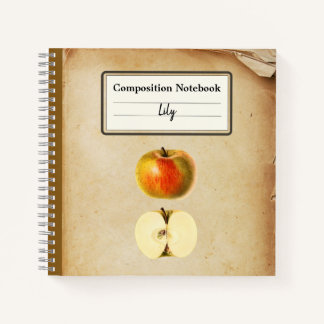 Ein Vintager Apple und ein halber Personalisierter Notizbuch
