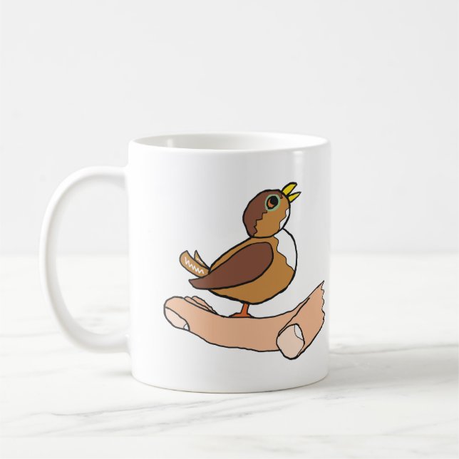 Ein Vogel in der Hand Kaffeetasse (Links)