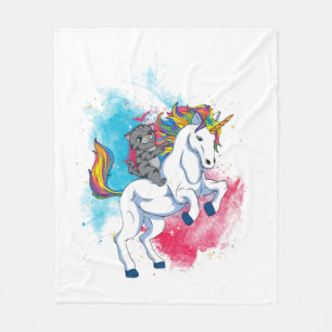 Ein weißes Einhorn mit Regenbogen-Schwanz, geritte Fleecedecke