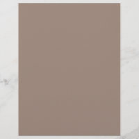 eine braune Mauer mit einer Uhr darauf