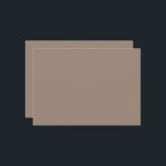 eine braune Mauer mit Einladung<br><div class="desc">Das Design ist nah in einer beigen Wand gehalten,  die anscheinend Teil eines Gebäude ist. Die Wand ist glatt und hat eine einheitliche Struktur,  die ihr ein schlichtes und einfaches Aussehen verleiht.</div>