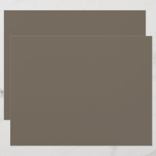 eine braune Wand mit einer schwarz-weißen Uhr Briefbogen