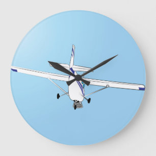 Eine Cessna im Flug Große Wanduhr