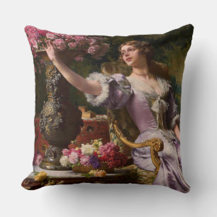 Eine Dame in einem Lilac-Kleid mit Blume Kissen