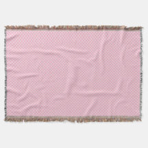 Eine dekorative rosa Wurfdecke mit einem subtilen