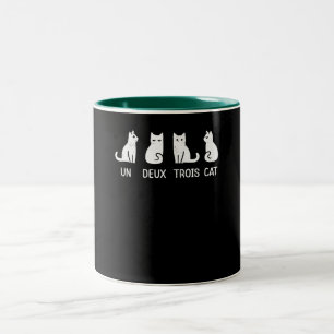 Eine Deux-Trois-Katze Zweifarbige Tasse