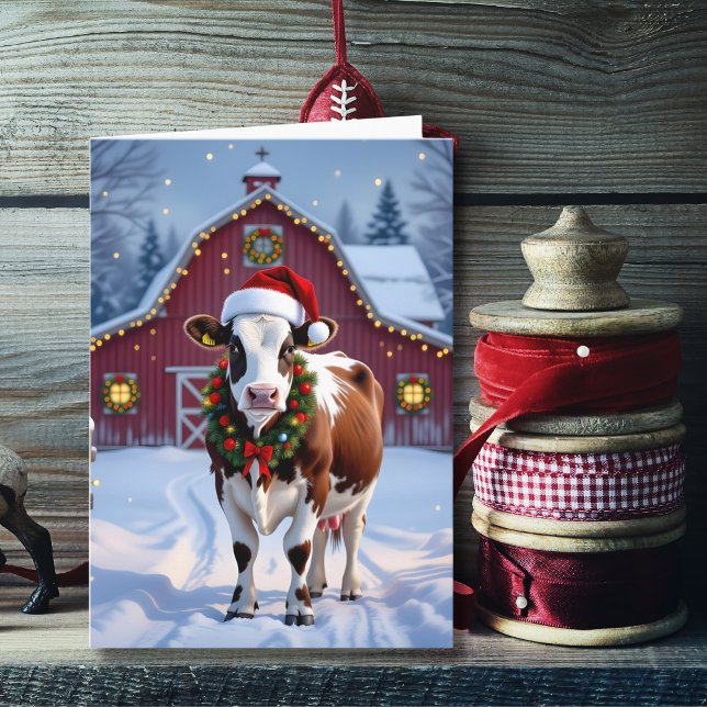 Eine festliche Kuh in der Weihnachtsmannmütze Weih Karte (Von Creator hochgeladen)