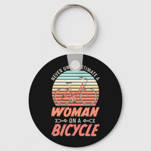 Eine Frau auf dem Fahrrad Schlüsselanhänger