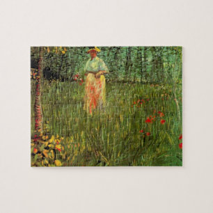 Eine Frau, die in einem Garten von Vincent van Gog