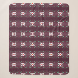 Eine geflochtene Decke mit Rot und Pflaume Sherpadecke