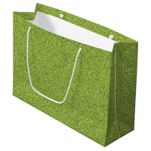 Eine grüne Einkaufstasche mit einem weißen Griff Große Geschenktüte