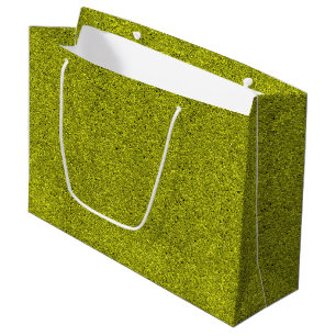 Eine grüne Geschenktasche mit einem weißen Griff Große Geschenktüte