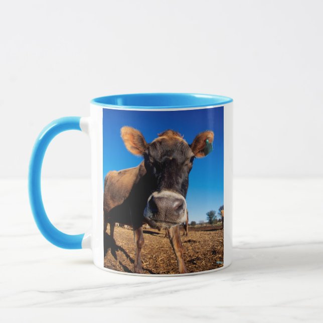 Eine Jerseykuh ist neugierig Tasse (Links)