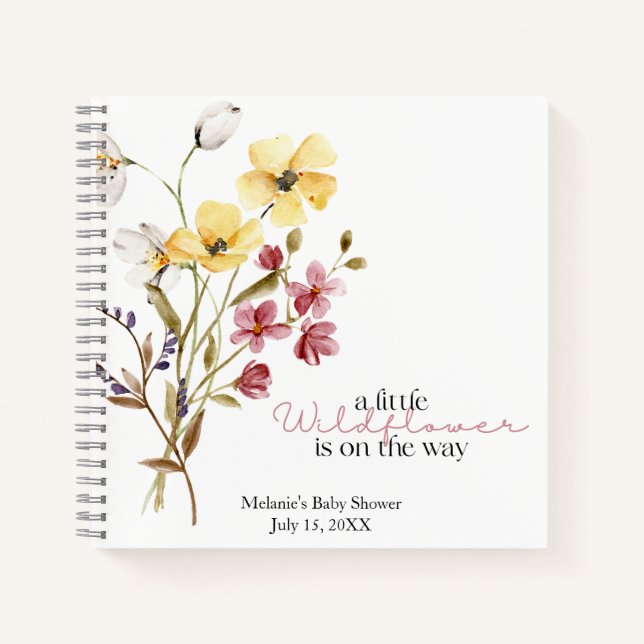 Eine kleine Wildblume befindet sich auf dem Shower Notizbuch (Vorderseite)