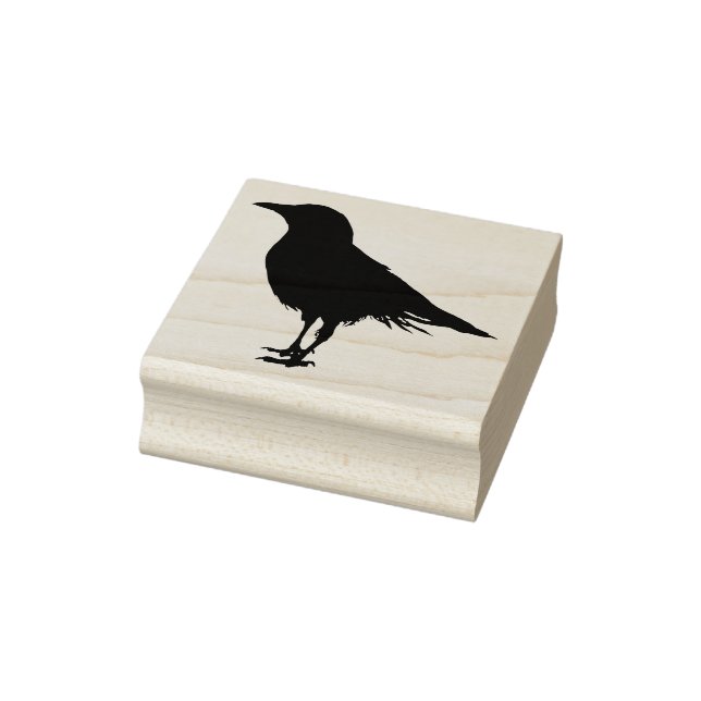 Eine Krähe, die in Silhouette stehend ist Gummistempel (Stempel)