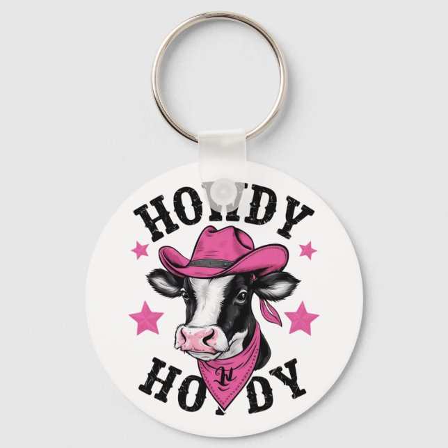 Eine Kuh mit einem lebhaften rosa Cowboy Schlüsselanhänger (Vorderseite)