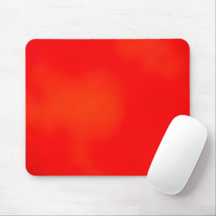 Eine lebendige rote und orange rechteckige Tischma Mousepad