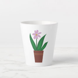 Eine Lila Blume in einem Topf Milchtasse