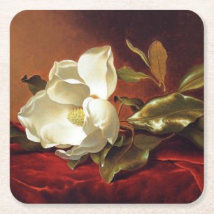 Eine Magnolie auf rotem Samt Rechteckiger Pappuntersetzer