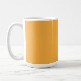Eine Mischung aus Gelb- und Orangetönen verleiht d Kaffeetasse