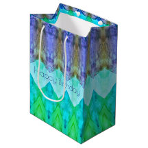 Eine mittelgroße Geburtstagsgeschenktasche in Lila