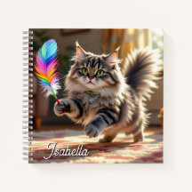 Eine Niedliche, flauschige Katze, die eine Feder j