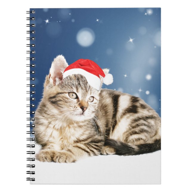 Eine Niedliche Katze, die einen Weihnachtsschnee i Notizblock (Vorderseite)