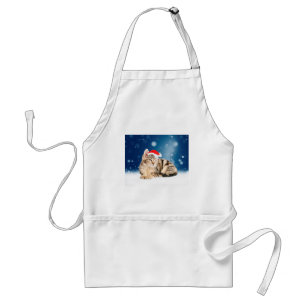 Eine Niedliche Katze, die einen Weihnachtsschnee i Schürze