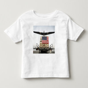 Eine Palette, die humanitäres Entlastung supplie Kleinkind T-shirt