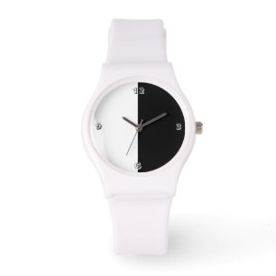 EINE SCHWARZE UND WEISSE SACHE ARMBANDUHR