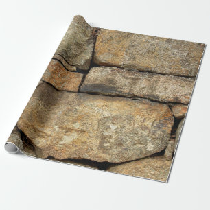 Eine Steinmauer aus Kopfsteinpflaster Hintergrundt Geschenkpapier
