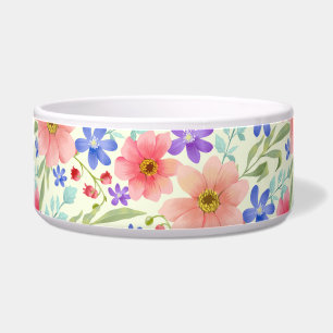 Eine weiße Keramikschale mit einem bunten floralen Napf
