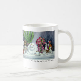 Eine wirkliche Katze und einiges Kaffeetasse