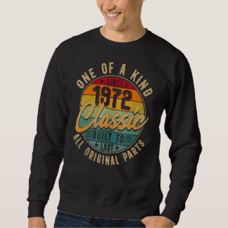 Eines der klassischen Gebäude aus dem Jahr 1972, d Sweatshirt