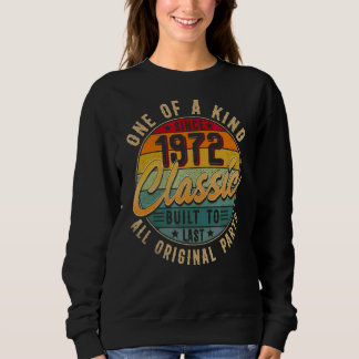 Eines der klassischen Gebäude aus dem Jahr 1972, d Sweatshirt
