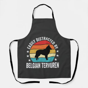 Einfach abgelenkt durch belgischen Tervuren-Hund Schürze