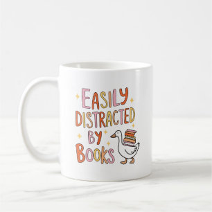 Einfach ablenkbar durch Bücher Kaffeetasse