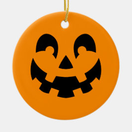 Einfache schwarze Kürbisgesicht an orangefarbenem Keramik Ornament