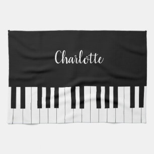 Einfache und elegante Piano-Tastatur in Schwarz un Geschirrtuch