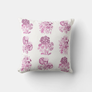 Einfarbige Blumen in Rosa Kissen